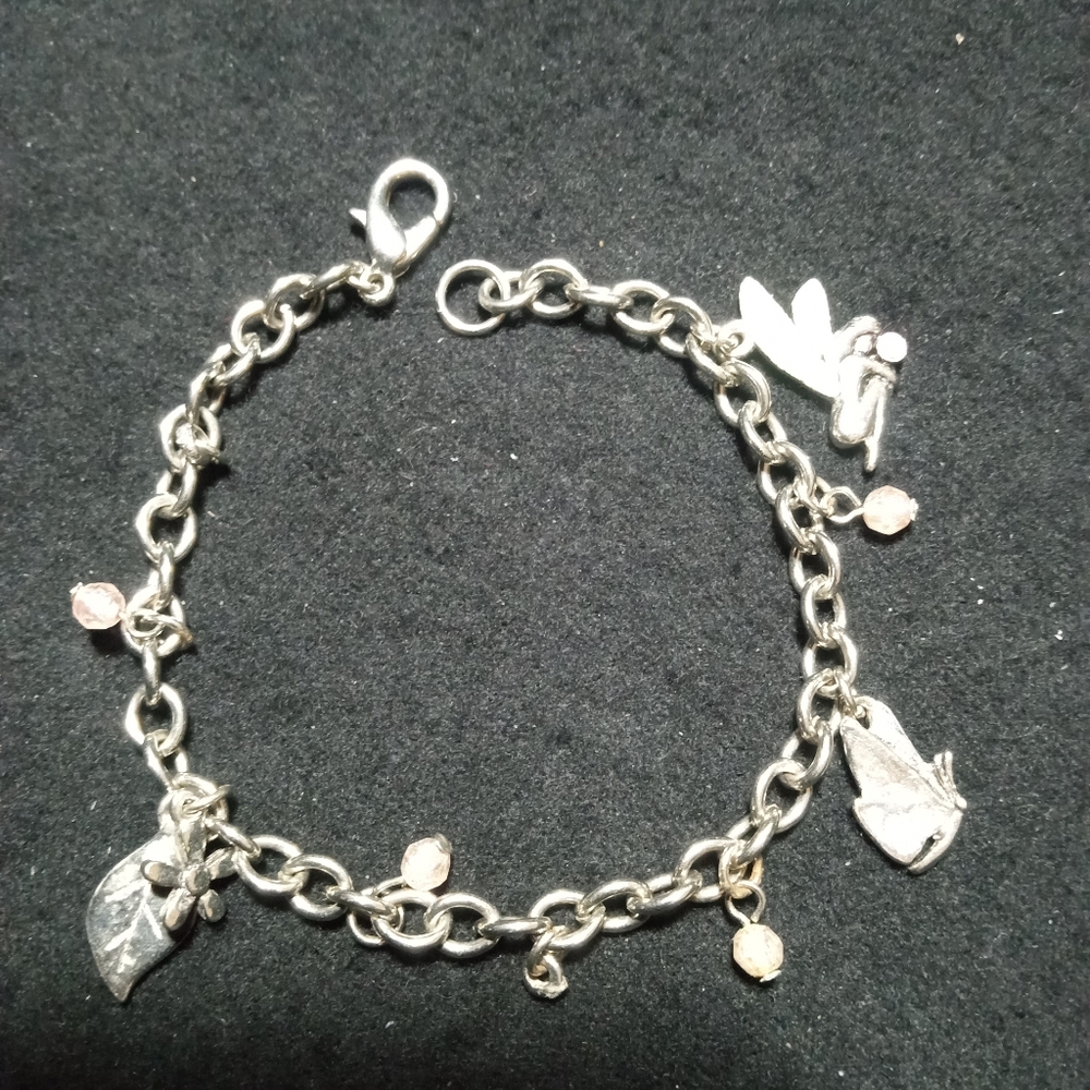 7" silver tone charm bracelet.
